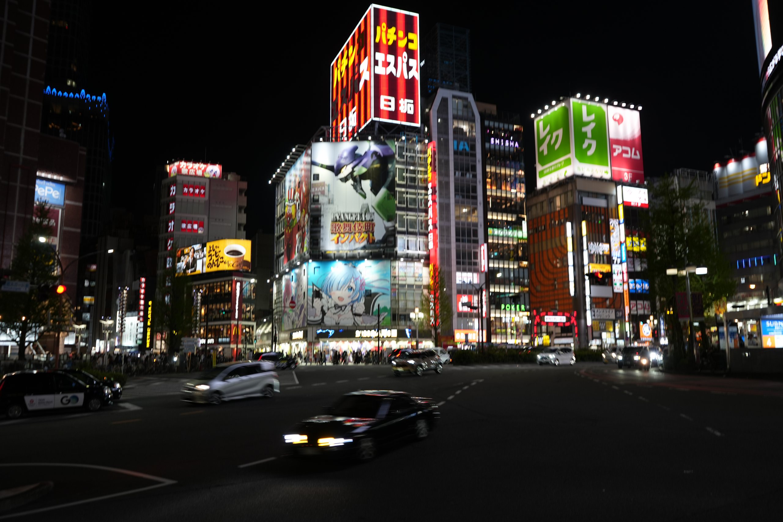 Neon signs and buildings at night in Shinjuku, Tokyo